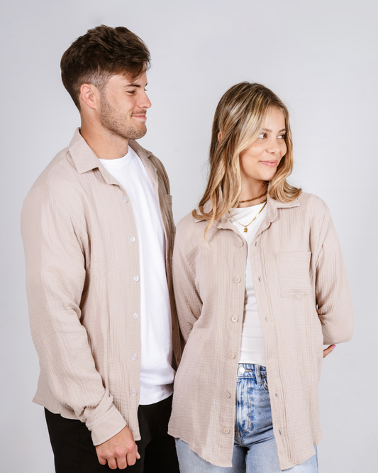 Male and female wearing the Button up cotton shirt in colour beige