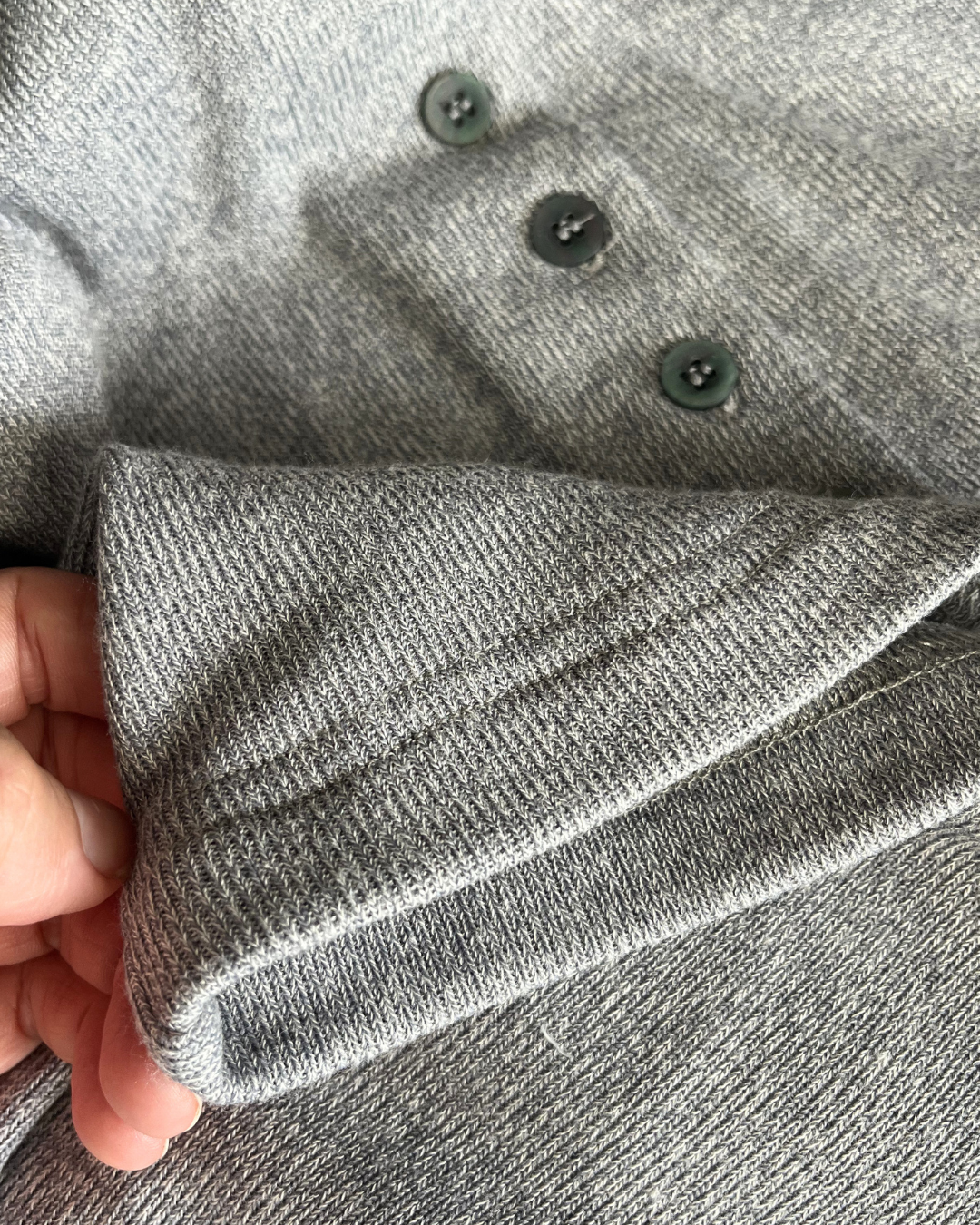 Close up of button up knit dress