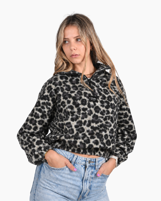 Female wearing a Leopard print retro jersey in studio