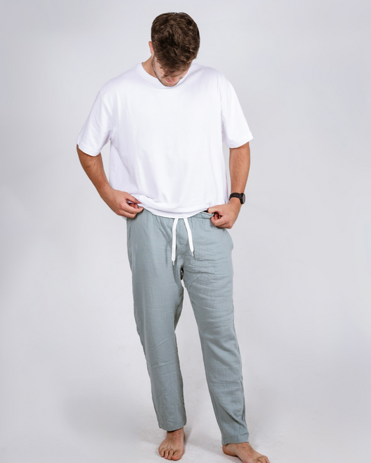 Male teal cotton pants with a white shirt