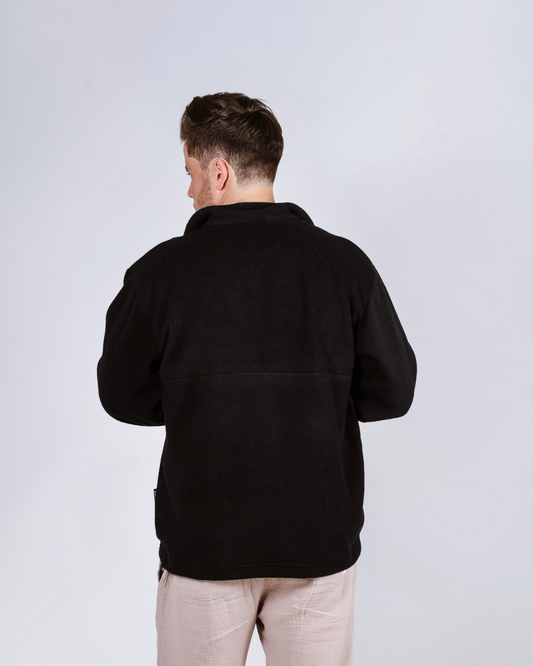 Male wearing the Quarter zip fleece jersey back