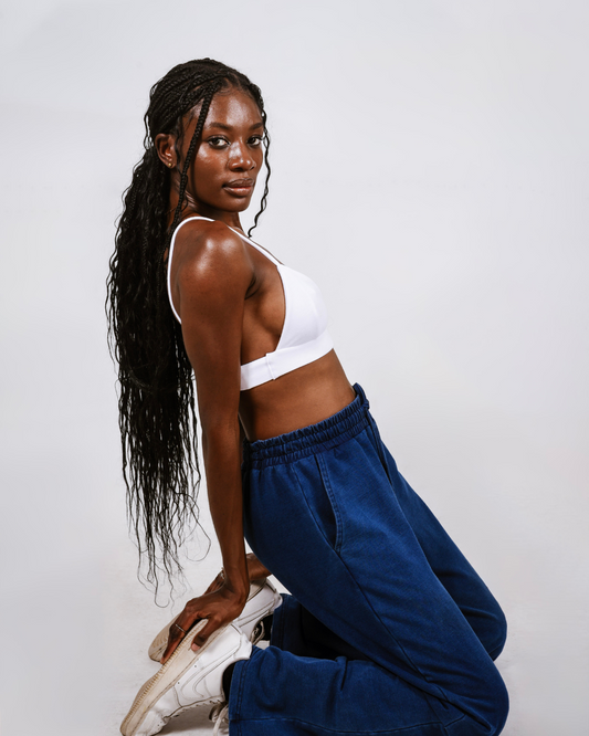 Woman wearing a white cotton bralette