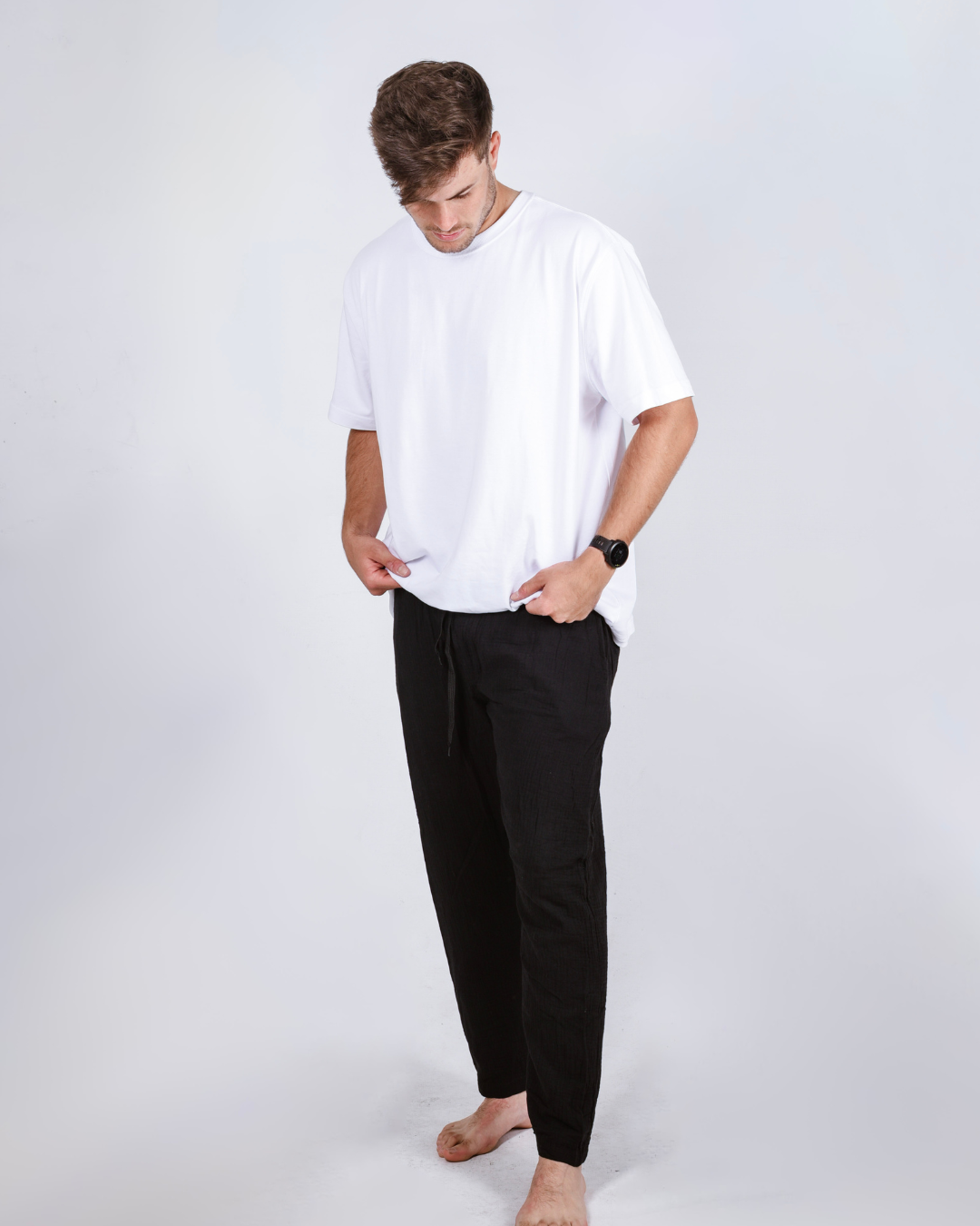 Male black cotton pants with a white shirt