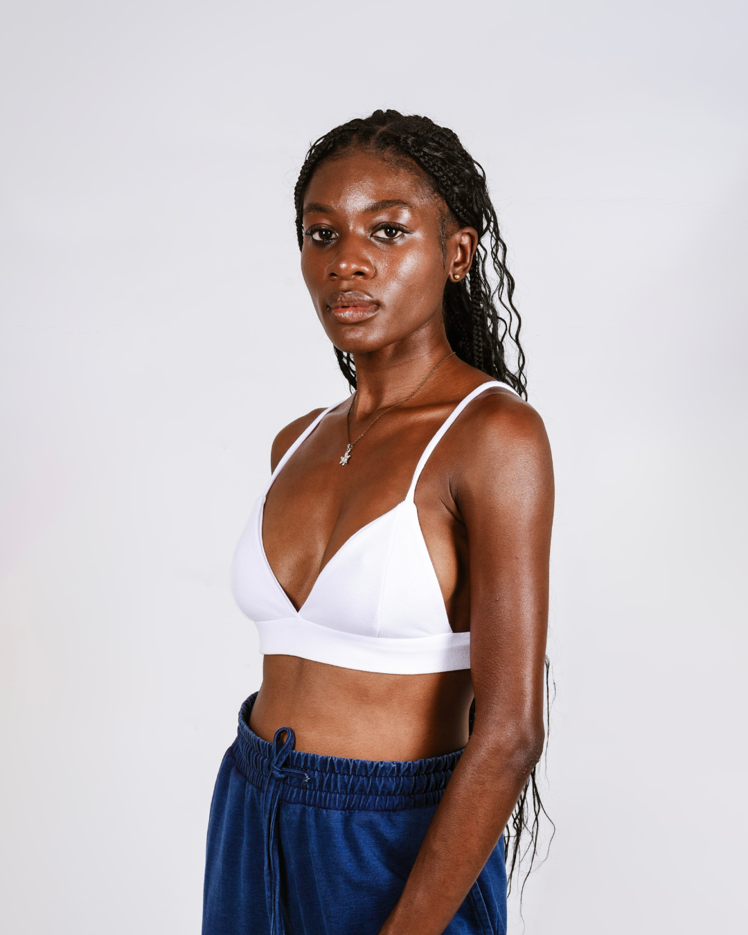 Woman wearing a white cotton bralette