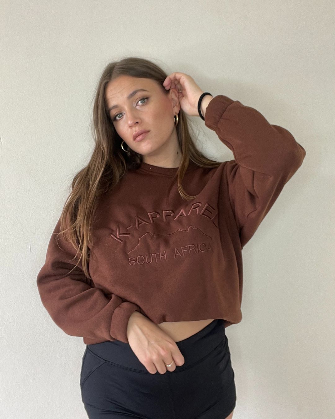 South African brown crewneck sweaters