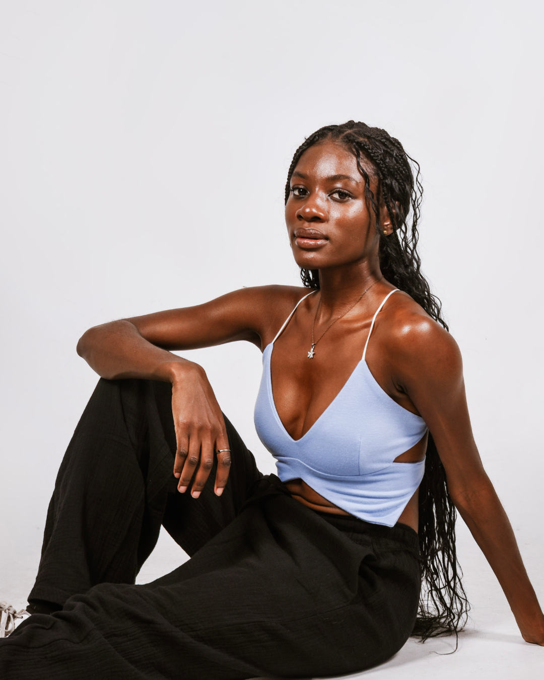 Female wearing Butterfly crop top in colour blue