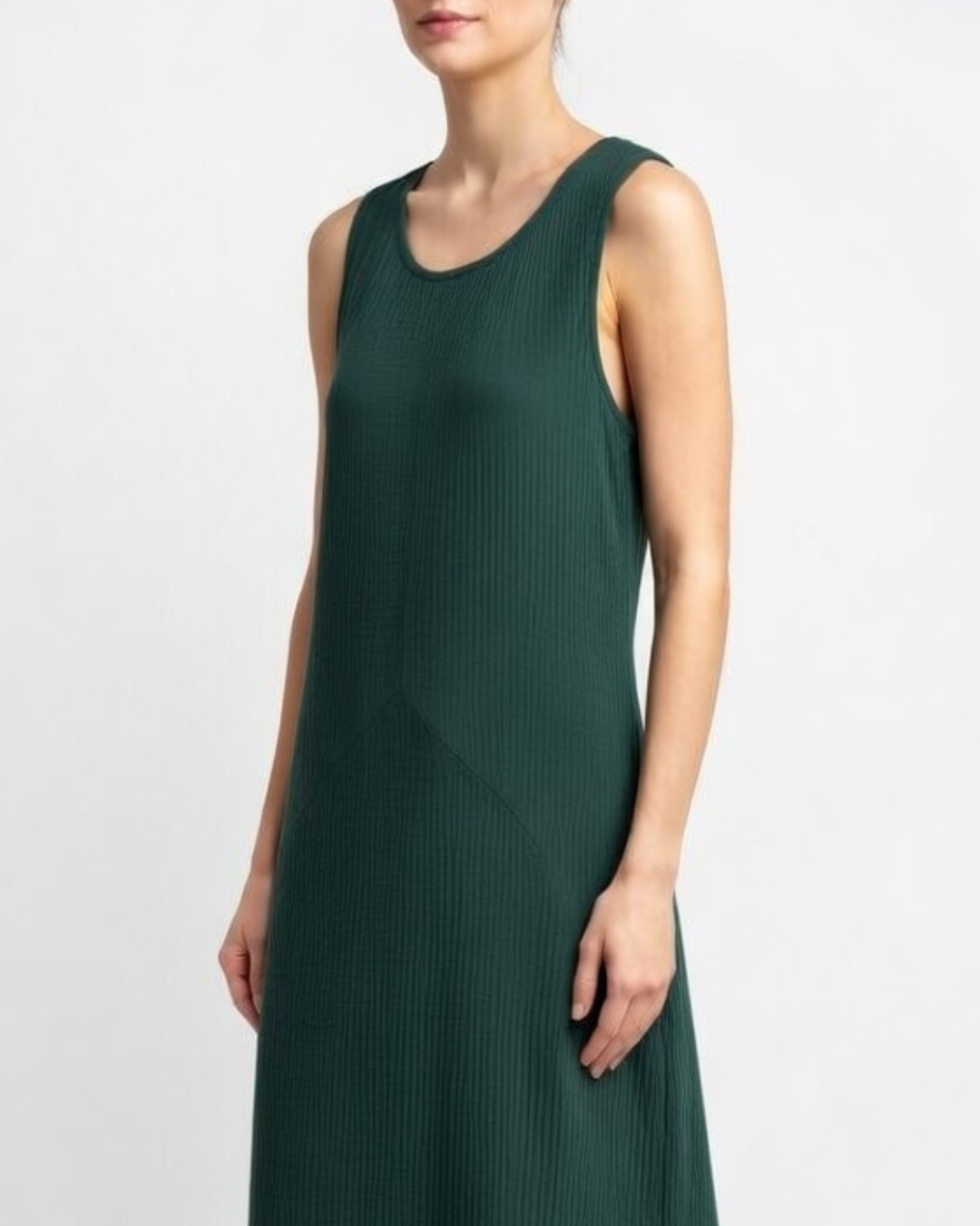 Female wearing a sleeveless cotton maxi dress - side view 