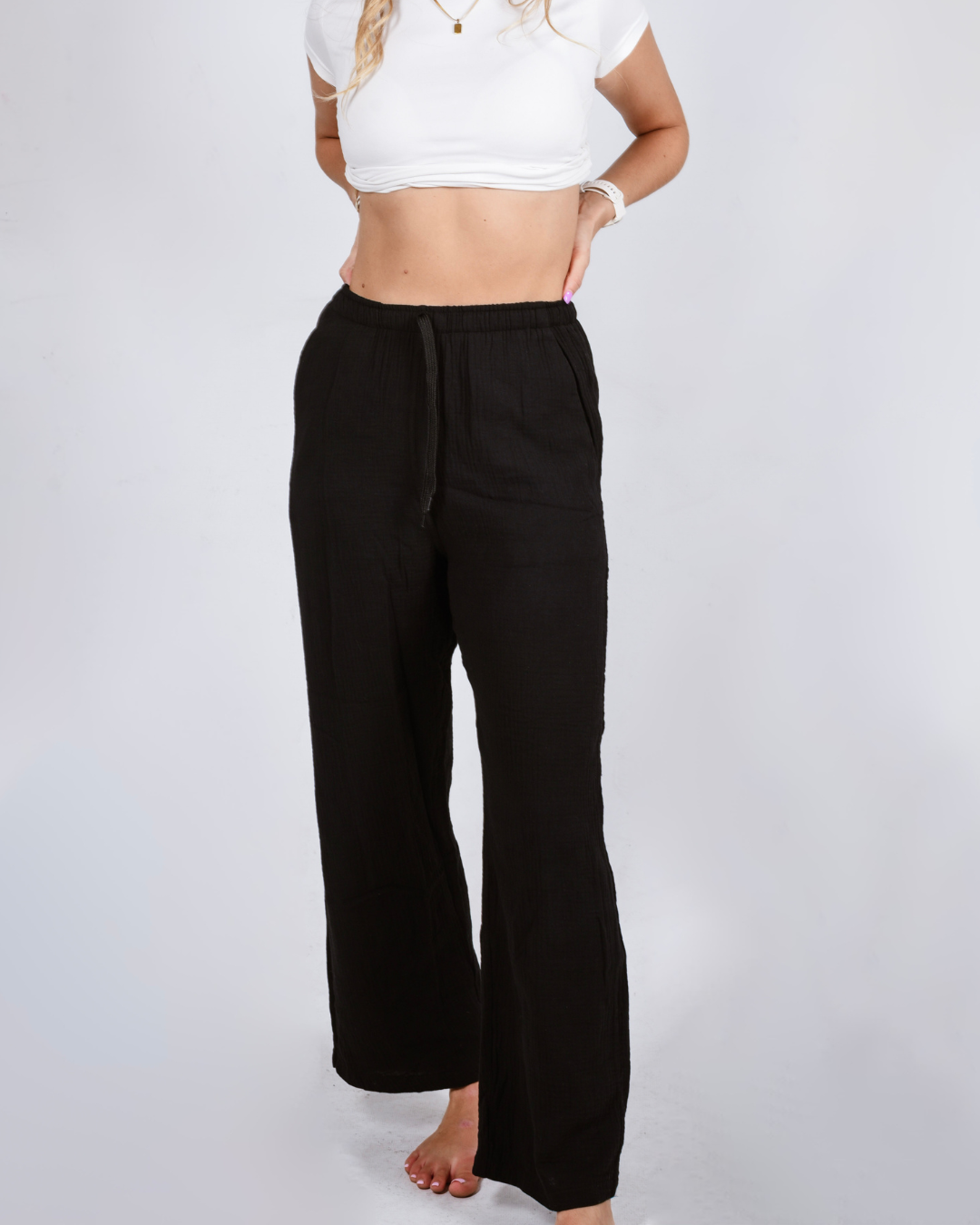 Female wearing cotton high waisted pants 