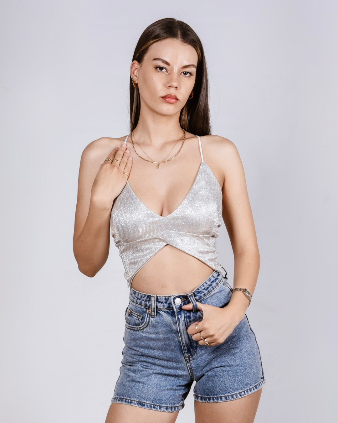 Female wearing a Glitter butterly corset top in colour champaign 