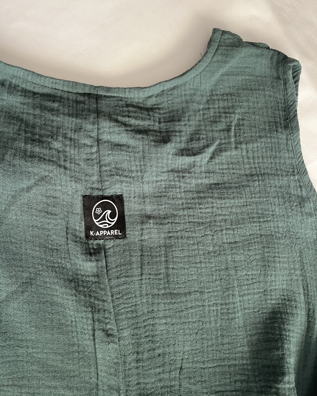 Close up of the green. maxi dress back view 