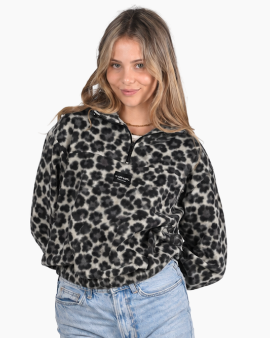 Female wearing a Leopard print retro jersey